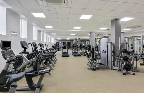 Queens House | Building with fitness room and AC in cool Far Rockaway