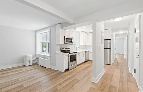 Queens House | Building with fitness room and AC in cool Far Rockaway