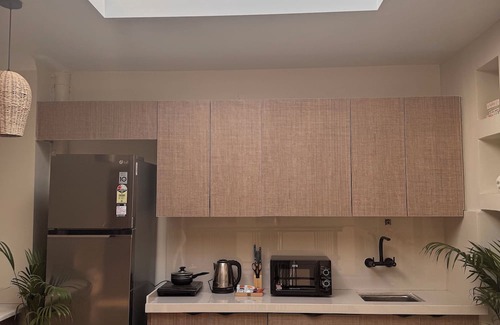 Tonk Road Apartment | Charming 2-bedroom apartment in Jaipur with skylight, terrace deck & kitchenette