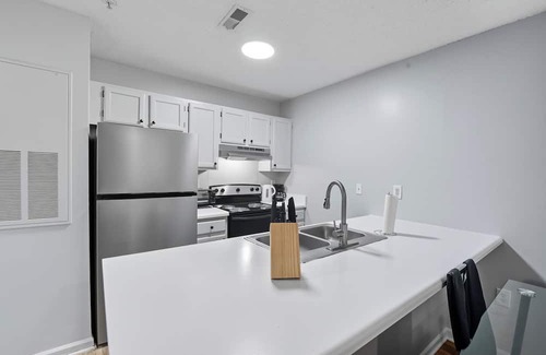 Fayetteville Apartment | Bright Modern 1BR Retreat I Fitness Center