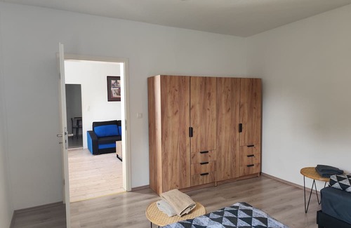 Hagen Apartment | Charming house within a house - vacation & business apartment with private terrace.
