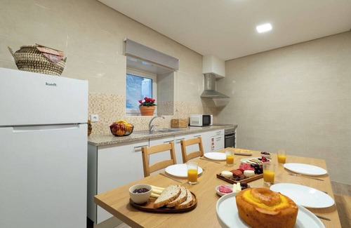 Vila Nova de Gaia House | Rustic and Modern Stone House by Host Wise