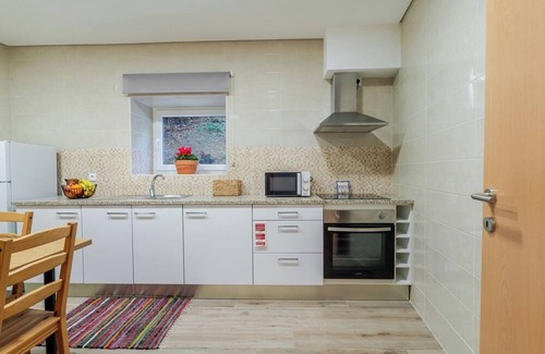 Vila Nova de Gaia House | Rustic and Modern Stone House by Host Wise