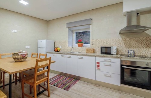 Vila Nova de Gaia House | Rustic and Modern Stone House by Host Wise