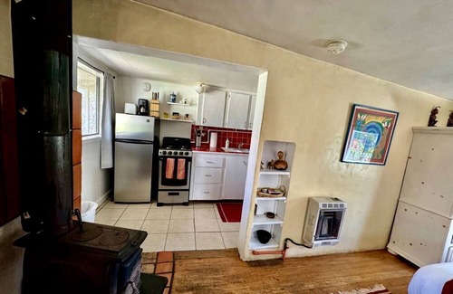 San Cristobal Cabin | Charming Log Cabin Rental on Eco-Farm near Taos Ski Valley