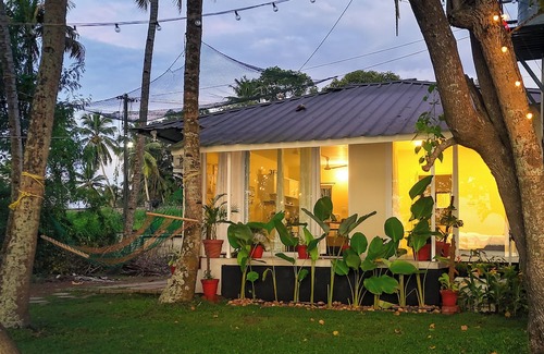 Munroe Island Cottage | Tropical Haven - 1BR Lakefront AC Cottage with Stunning Lakeview & Lake Access