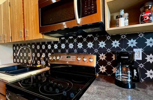 Town of Magrath Apartment | Small town motel-style stay!