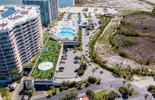 Orange Beach East Condo | Luxurious Bayside Four Bedroom Condo with Panoramic Views. Complimentary Boat Slip!