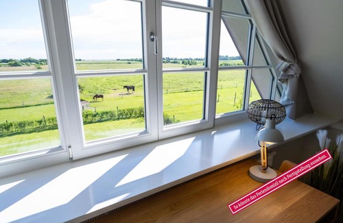 Borgsum House | Utblick vacation home in Borgsum: relax with a sea view and sauna