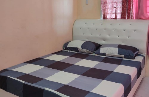 Jitra House | Charming 3-bedroom house in delightful Jitra with Aircond