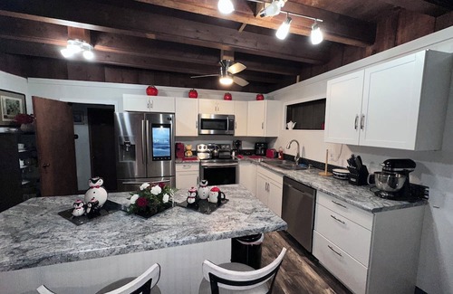 Cross Lanes Cabin | Rustic and restful 2-bedroom lake cabin in Cross Lanes with smart amenities.