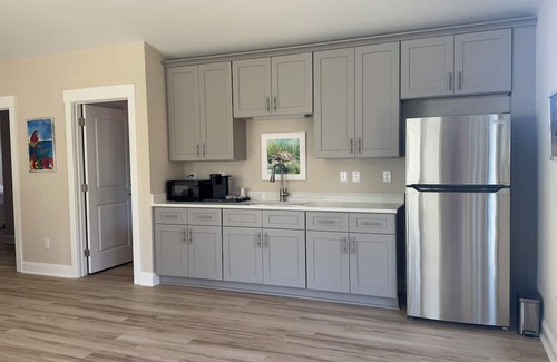 Elizabethtown Resort | Luxury Lodging, Lakefront View, 3-bedroom, 3.5 bath, sleeps 10, wrap-around patio.