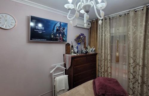Distrito Sur House | Shared accommodation a room with a view of the garden