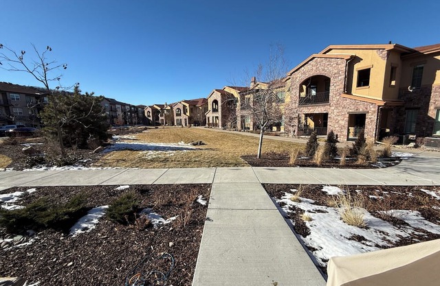 2-bedroom townhome with office, two car garage, walking trails- pets welcome!