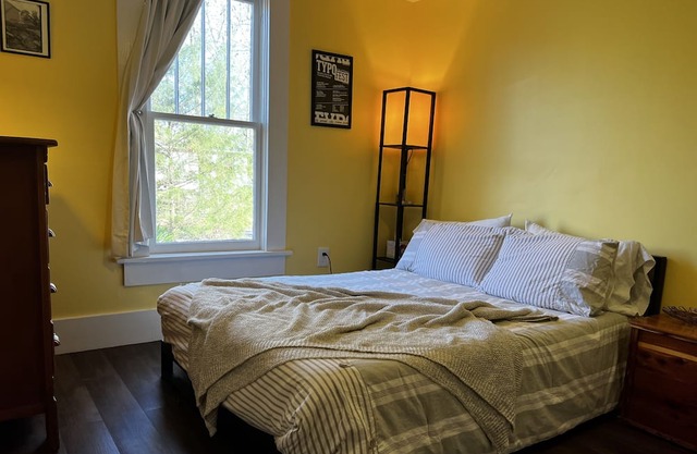 Bright and cozy space to rest in the heart of Hattiesburg.