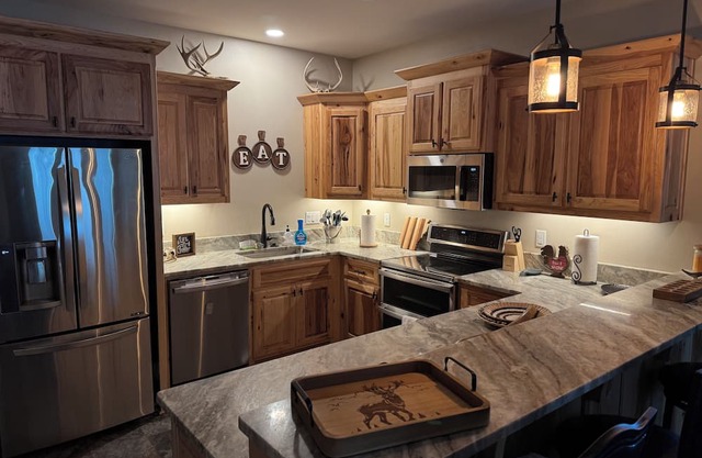 Charming Barndominium sits on 20 acres in Lonoke, AR.
