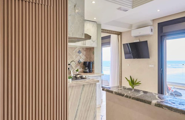 Wake to Waves: Stylish 1-Bedroom by the Shore