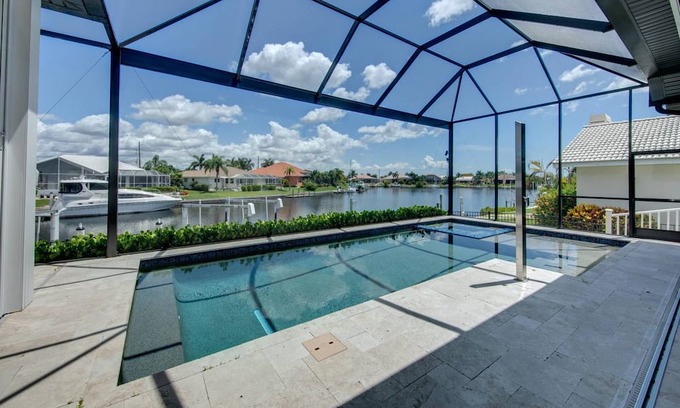 Punta Gorda House | NEW Luxury Executive Waterfront Home in Punta Gorda Isles! Dock, Pool/Spa, Beach Essentials, Bikes