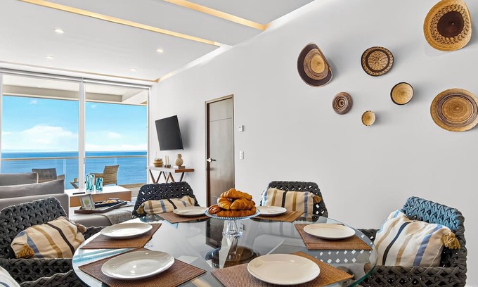Las Glorias Apartment | Beachfront 2BR - Pools & Balcony Views