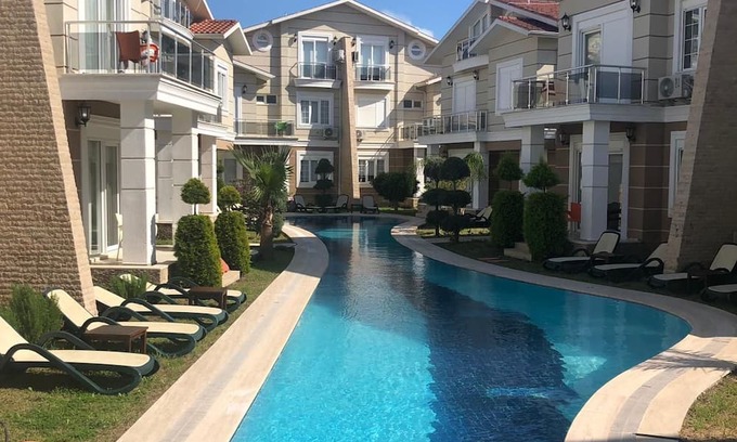 Belek Villa | A large swimming pool in a tranquil environment, offer a blend of comfort.