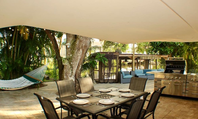Fort Myers Shores House | A Forest Pool Calloosahatchee River Retreat