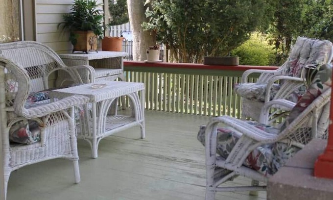 Onekama Apartment | Relax on deck next to the pool in this two room suite.