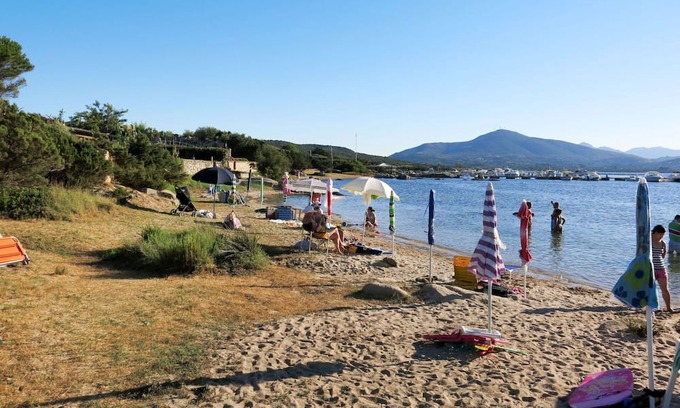 Porto Rotondo Apartment | Lovely apartment for 2 guests with WIFI, pool, A/C, TV, terrace, pets allowed and parking