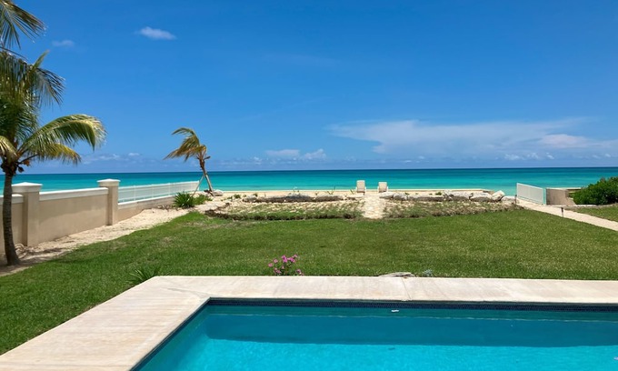 High Rock Villa | Beach front pool home with striking views and space for family and friends.