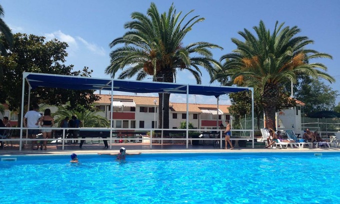 Falerna Apartment | Holiday Apartment "Trilocale 34 Residence La Giungla" with Sea View, Shared Pool & Wi-Fi