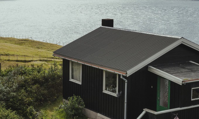 Leynar House | Cottage with stunning view of the sea and islands.