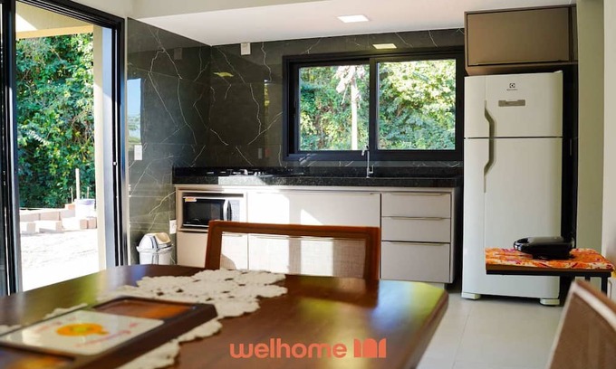 Delfinopolis Apartment | Studio em Delfinopolis com praia no condomínio